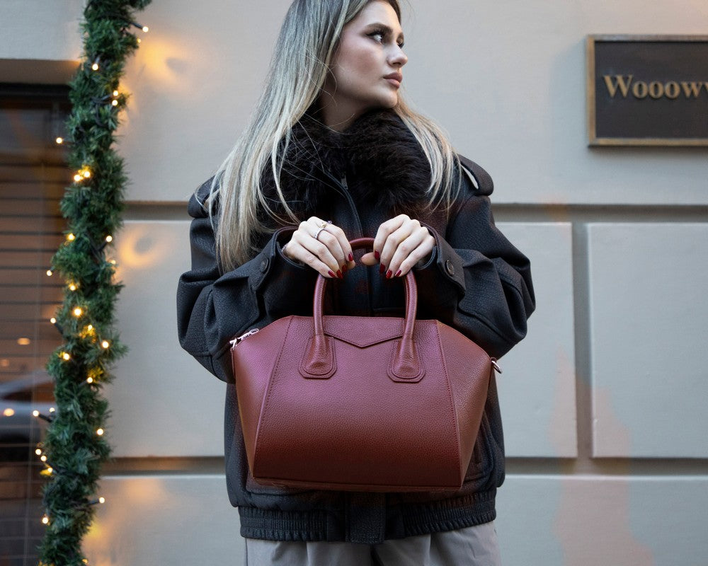 Black Lorenza leather women's bag by Mizuri Leather, medium-sized handbag with stylish design and sturdy leather straps.