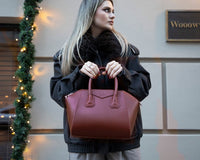 Black Lorenza leather women's bag by Mizuri Leather, medium-sized handbag with stylish design and sturdy leather straps.