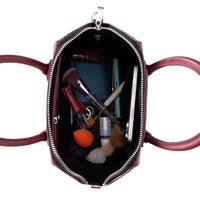 Black Lorenza leather women's bag by Mizuri Leather, medium-sized with stylish design and sturdy handles.