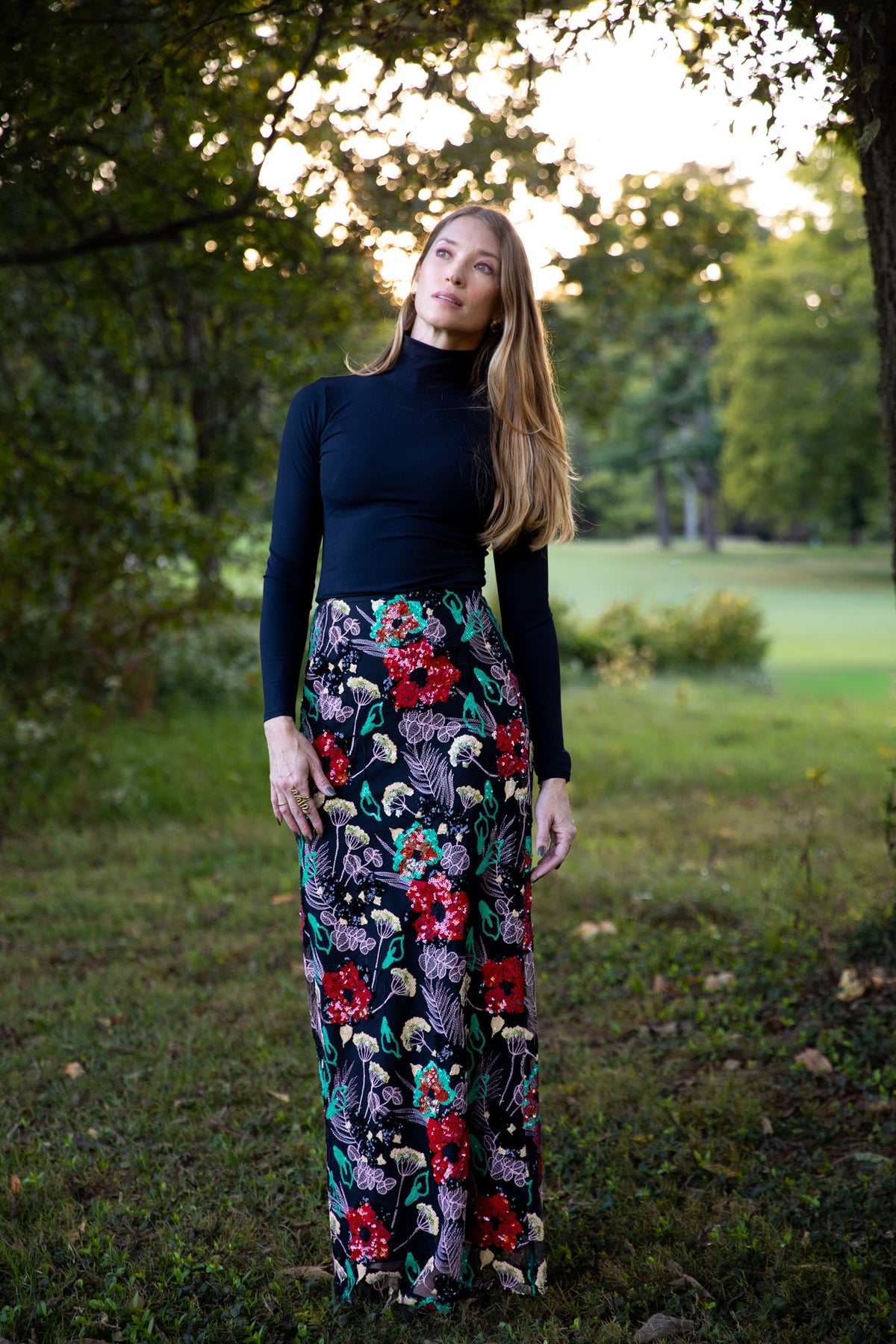 Modafleur The JC Sequin Skirt showing a stylish silver sequined skirt with a fitted waist and above-knee length.