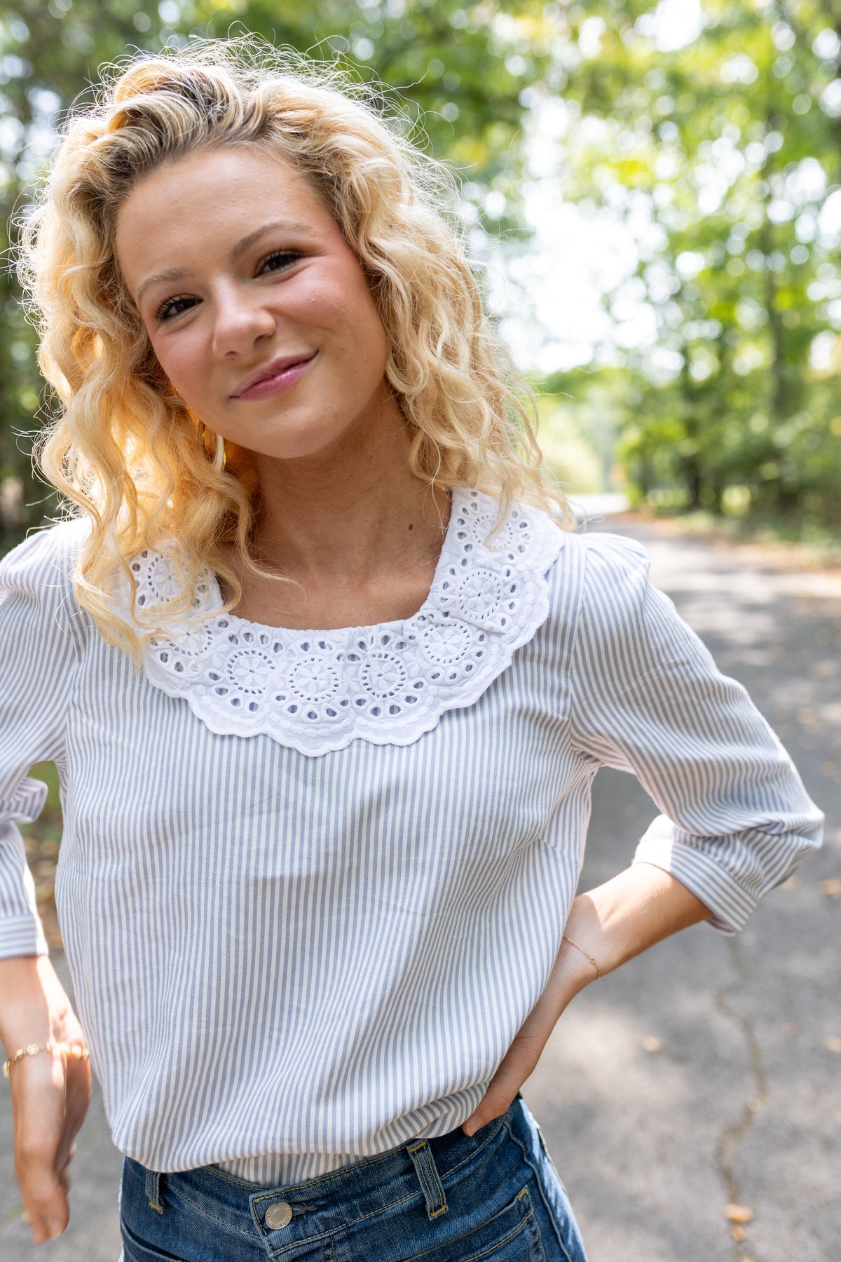 Modafleur The Louise Top in XS, stylish women's clothing with a fitted design and soft fabric, shown on a model.
