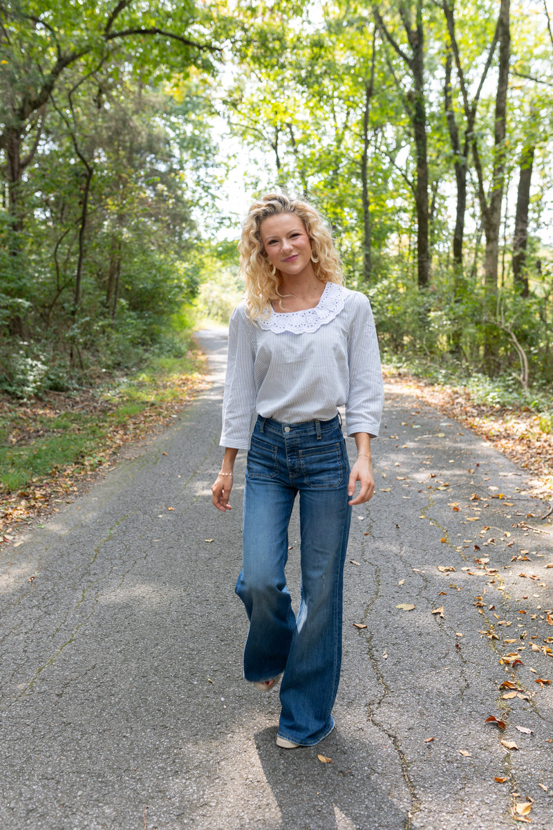 Modafleur The Louise Top, light-colored clothing top with a relaxed fit, shown on a model.