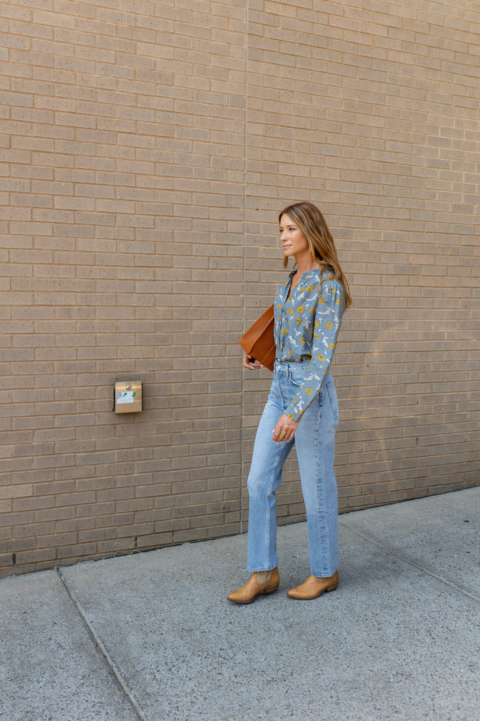 Modafleur The Marie Top in Blue Bell, a stylish women's clothing piece with a fitted design and soft fabric.