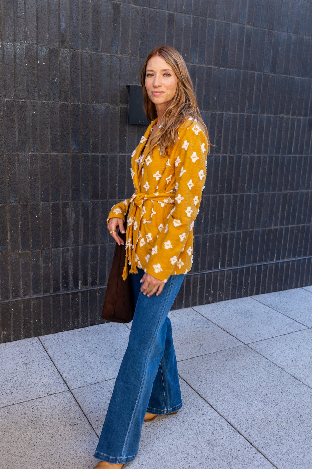 Modafleur The Stevie Shirt Jacket, lightweight clothing with a classic button-up design, shown in a close-up view.