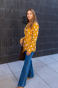 Modafleur The Stevie Shirt Jacket, lightweight clothing with a classic button-up design, shown in a close-up view.