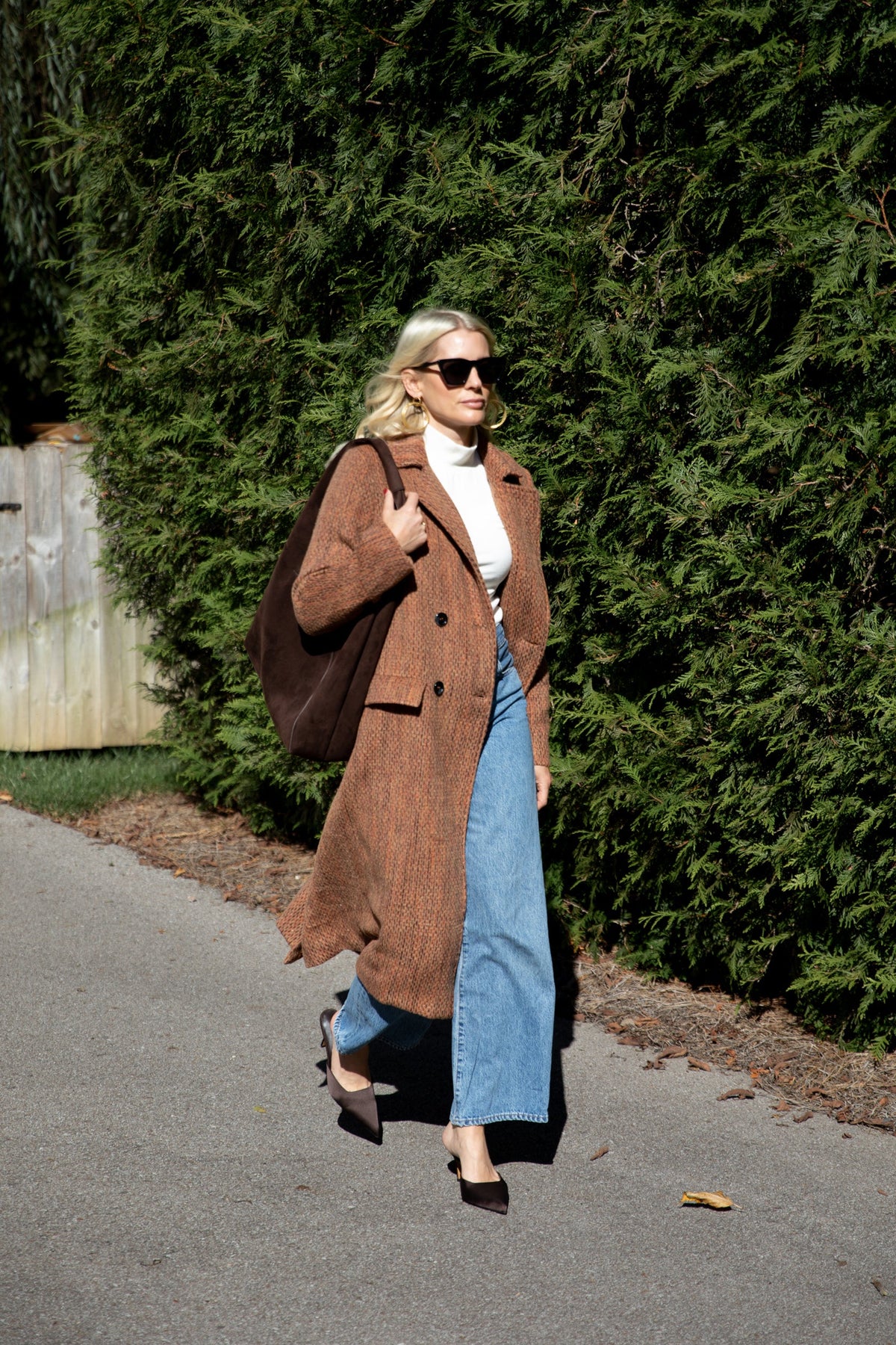 Light gray Modafleur Ivy Coat for women, shown on a model, featuring a tailored fit and classic design.