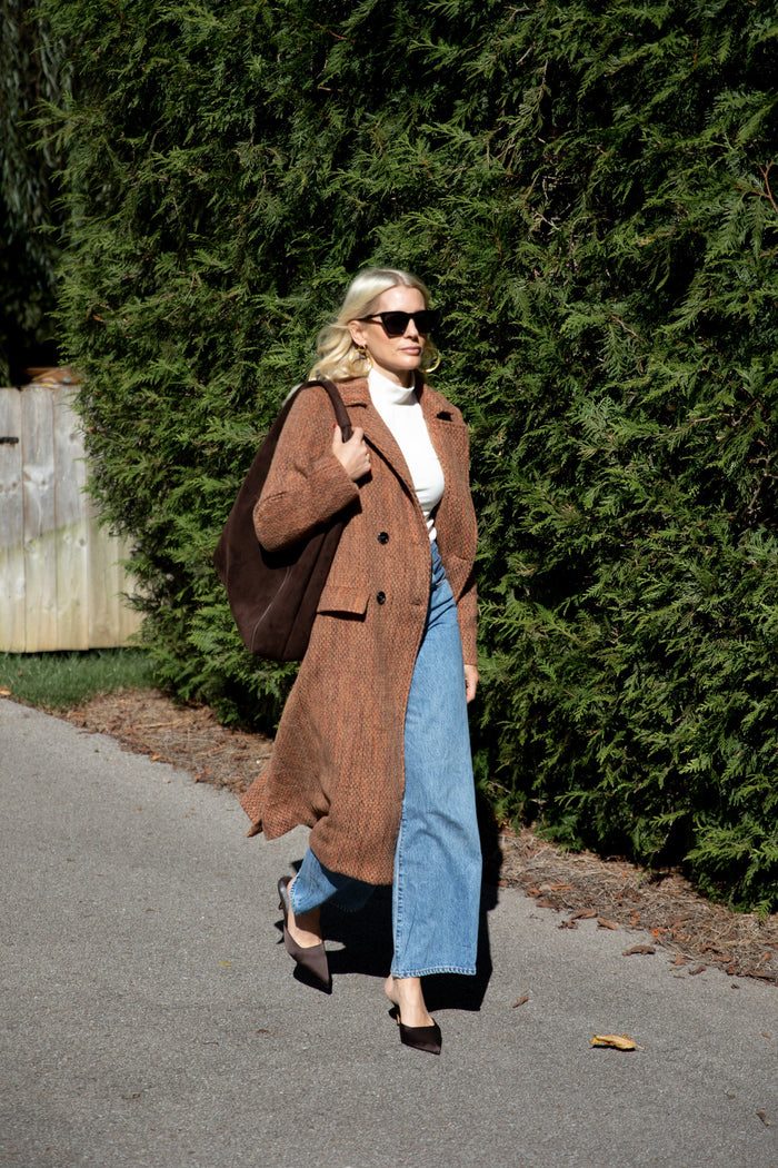 Light gray Modafleur Ivy Coat for women, shown on a model, featuring a tailored fit and classic design.