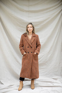 Light gray Modafleur Ivy Coat displayed on a hanger, showcasing its tailored fit and classic design.