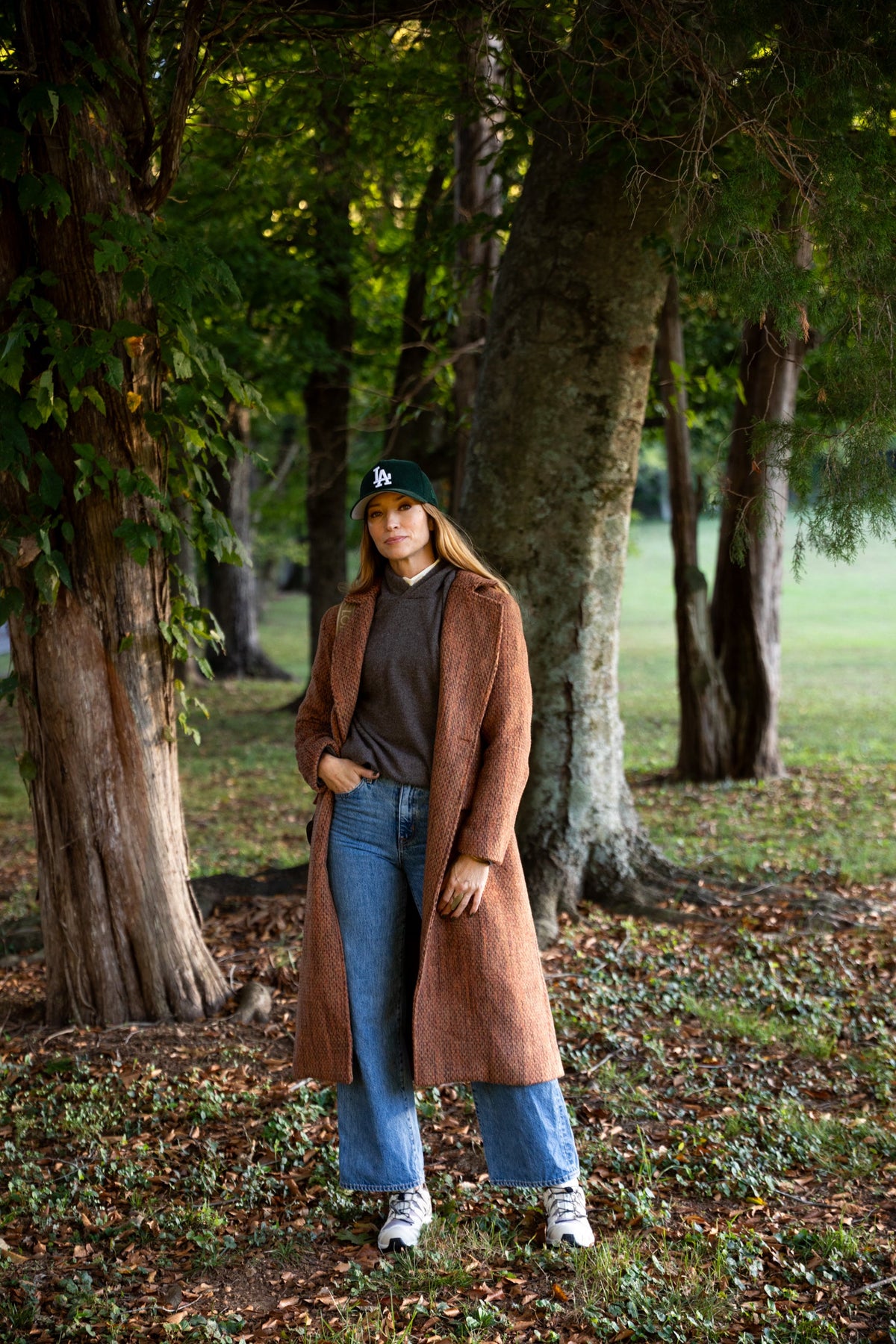 Light gray Modafleur The Ivy Coat in XS size, featuring a tailored fit and classic collar, displayed on a hanger.