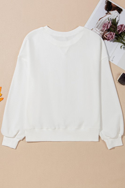 Long sleeve crewneck top with bow detail from My Pampered Life Seattle, showcasing the stylish, comfortable design.