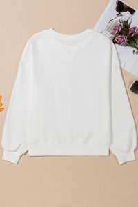 Long sleeve crewneck top with bow detail from My Pampered Life Seattle, showcasing the stylish, comfortable design.