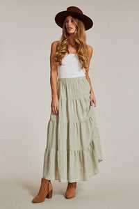 Light blue Miss Sparkling Prairie Maxi Skirt from My Pampered Life Seattle, shown on a dress form, flowing and elegant.