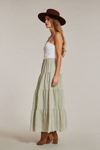 Light blue Miss Sparkling Prairie Maxi Skirt from My Pampered Life Seattle, flowing fabric, and elastic waistband.