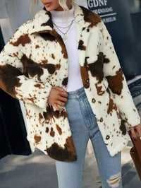 Miss Sparkling cow print sherpa jacket from My Pampered Life Seattle, shown in a cozy, plush sherpa fabric with a cow pattern.