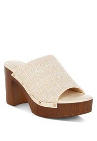 Marengo Raffia Wooden Clogs from My Pampered Life Seattle, showing woven raffia upper and wooden sole in a stylish footwear design.