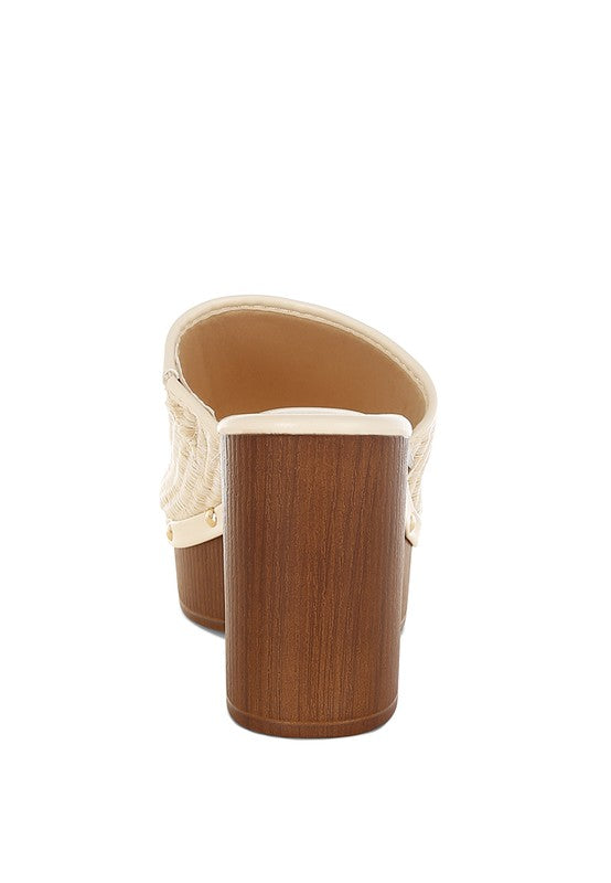 Marengo Raffia Wooden Clogs in natural wood and raffia, stylish footwear by My Pampered Life Seattle, with a chunky wooden sole.