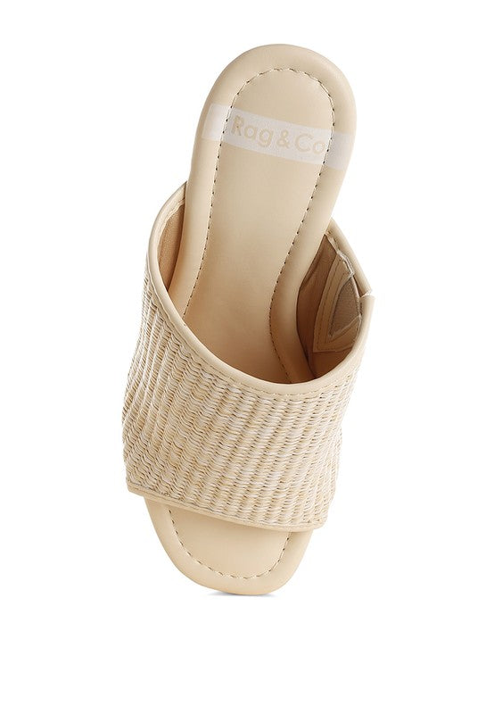 Marengo Raffia Wooden Clogs from My Pampered Life Seattle featuring woven raffia straps and wooden soles.