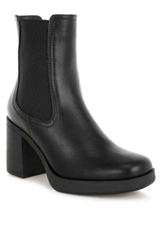 Black Scuala faux leather Chelsea boots with elastic side panels and low heel, stylish footwear by My Pampered Life Seattle.