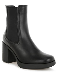 Black Scuala faux leather Chelsea boots with elastic side panels and low heel, stylish footwear by My Pampered Life Seattle.