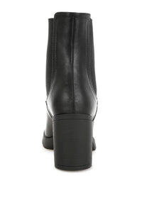 Black faux leather Chelsea boots from My Pampered Life Seattle, stylish ankle footwear with elastic side panels.