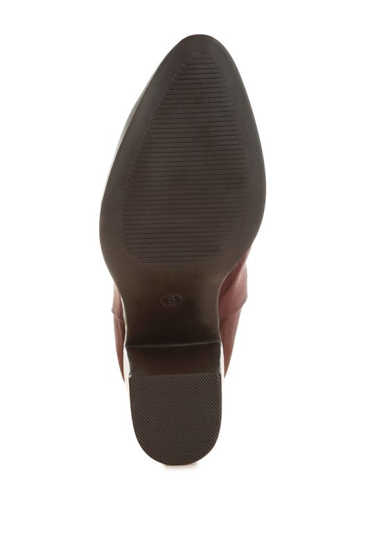 Eigur high block heel boots by My Pampered Life Seattle, stylish black footwear with a chunky heel and sleek design.