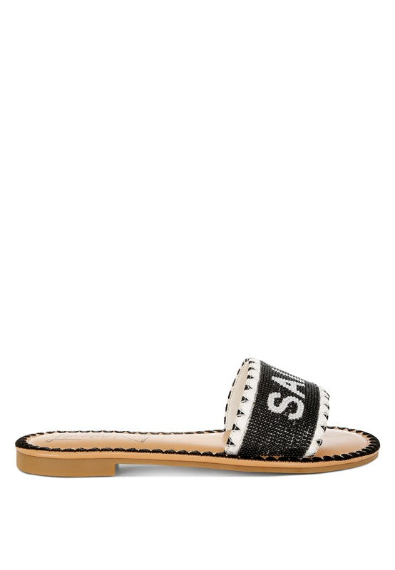 Beaded Saint Tropez flat slip-ons by My Pampered Life Seattle, stylish footwear with intricate bead detailing.