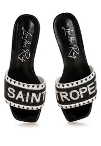 My Pampered Life Seattle Poshta Saint Tropez beaded slip-on heels with elegant design and intricate beadwork on stylish footwear.