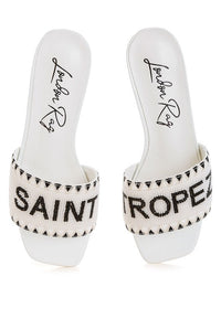 Poshta Saint Tropez beaded slip-on heels by My Pampered Life Seattle, featuring intricate beadwork and a sleek silhouette.
