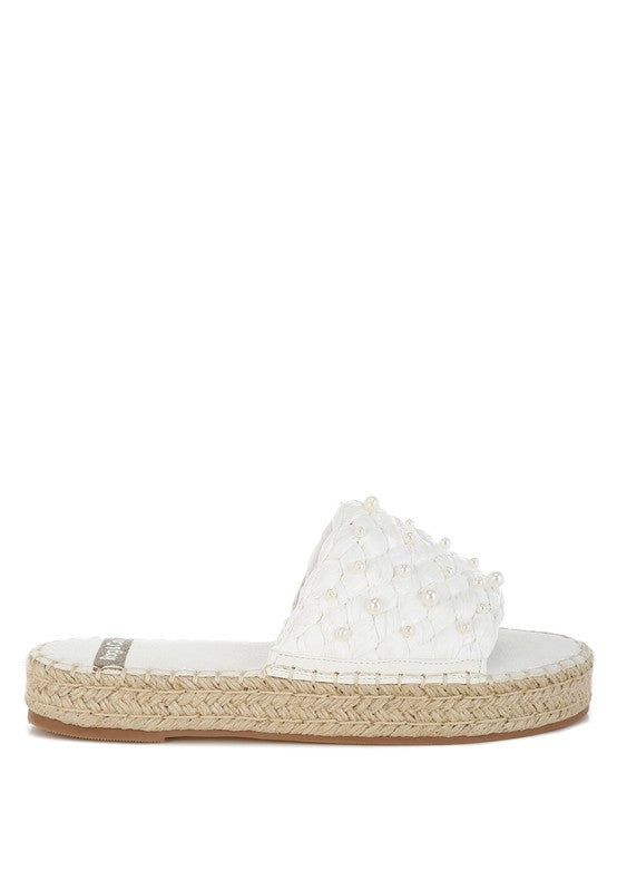 Yakna Pearl Embellished Woven Flats from My Pampered Life Seattle, showcasing intricate woven design and pearl embellishments.