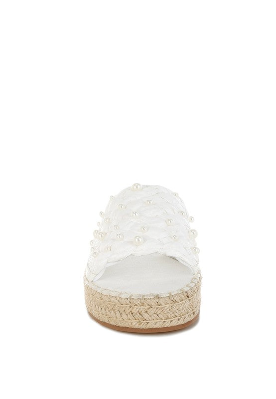 My Pampered Life Seattle Yakna Pearl Embellished Woven Flats featuring intricate woven design and pearl accents.