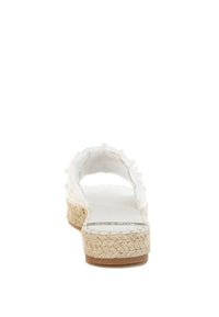 Pearl-embellished woven flats from My Pampered Life Seattle, stylish footwear with intricate weaving and elegant pearl accents.