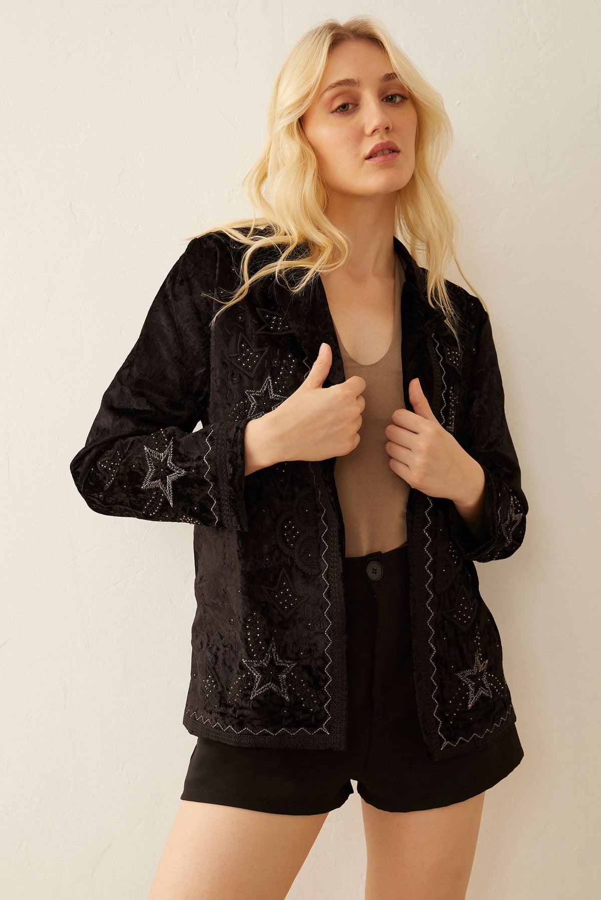 Black Night Star jacket by Myra USA, small size, stylish apparel with star pattern, displayed on a hanger.