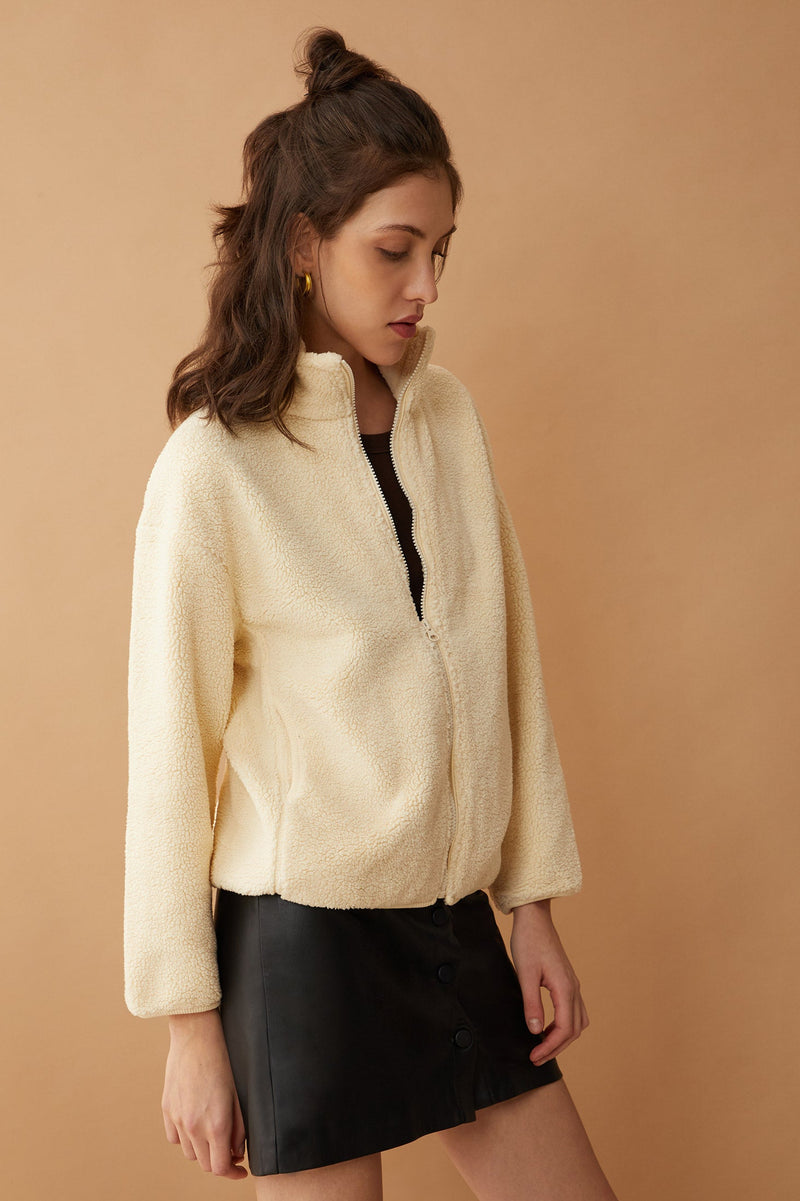 Myra USA Adelina fleece jacket, cozy and warm, shown in a close-up image highlighting the soft fleece fabric and stylish design.