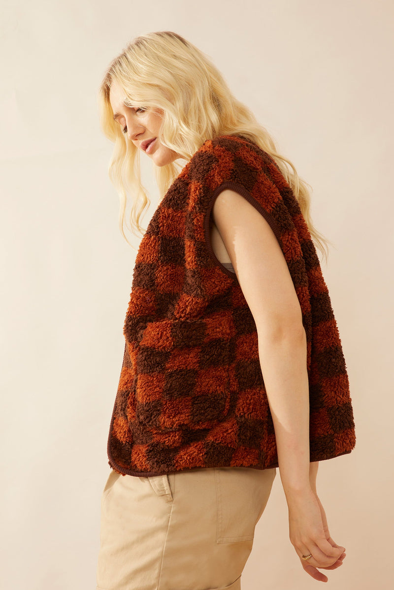 Myra USA Arabella vest jacket, stylish small-sized apparel, featuring a lightweight design with a collar and front pockets.