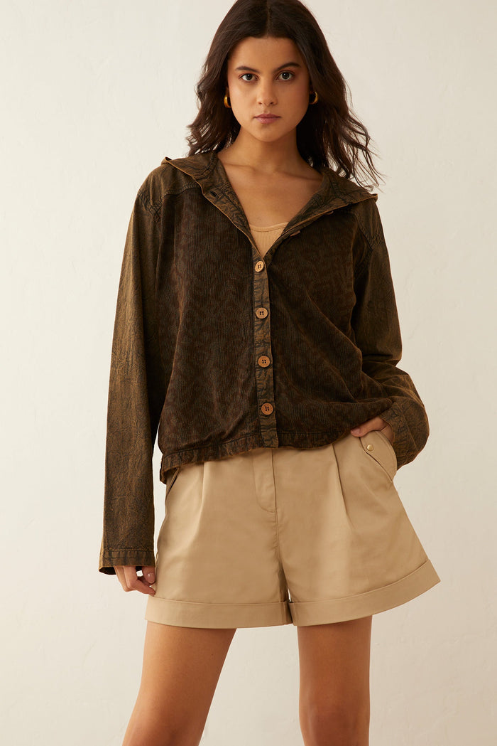 Deena Watson hooded patchwork jacket by Myra USA featuring mixed fabric patches and a cozy hood, stylish casual outerwear.