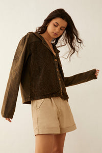 Myra USA Deena Watson hooded patchwork jacket with mixed fabric patches, front zipper, and adjustable hood.