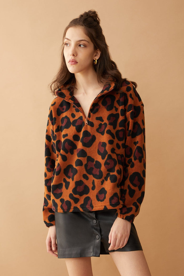 Myra USA Maren high collar jacket in animal print, stylish apparel with a bold pattern and cozy high neckline.