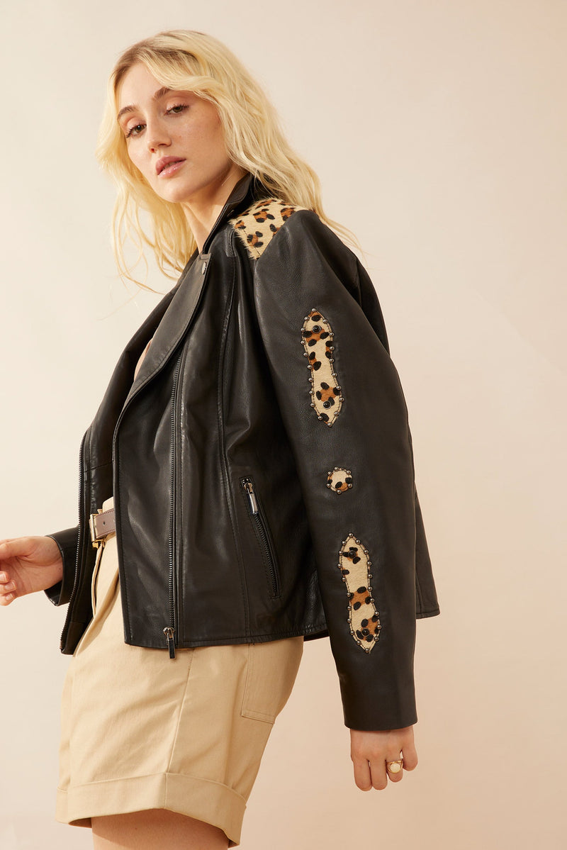 Myra USA Oren Leather Jacket for men, black, stylish, with classic collar and zip closure, displayed on a hanger.