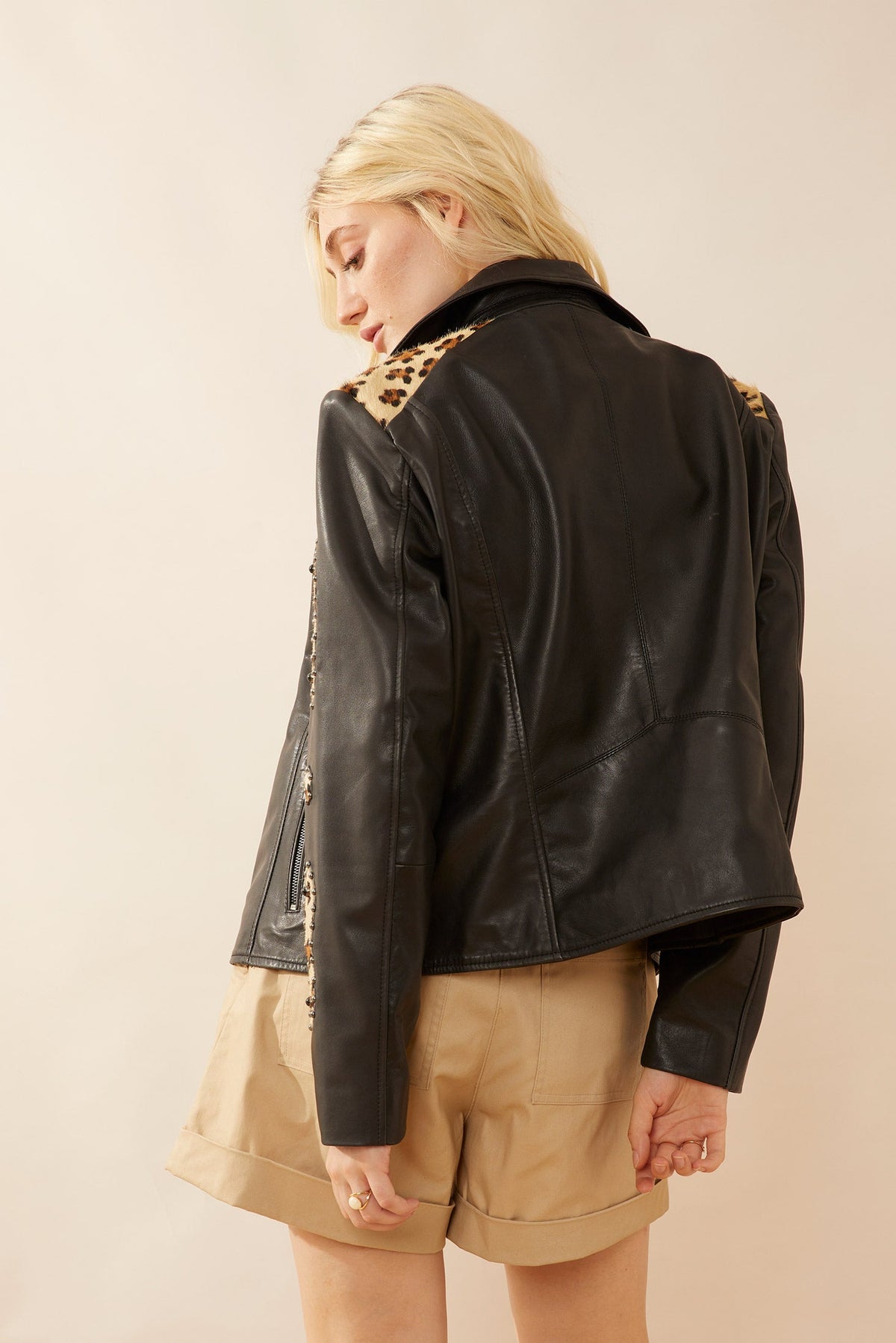 Myra USA Oren leather jacket for women, stylish black leather apparel with a classic collar and zipper details.