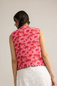 Blush pink cotton jacket from Myra USA's Bohera Sunset Palms collection, featuring palm leaf print and lightweight fabric.