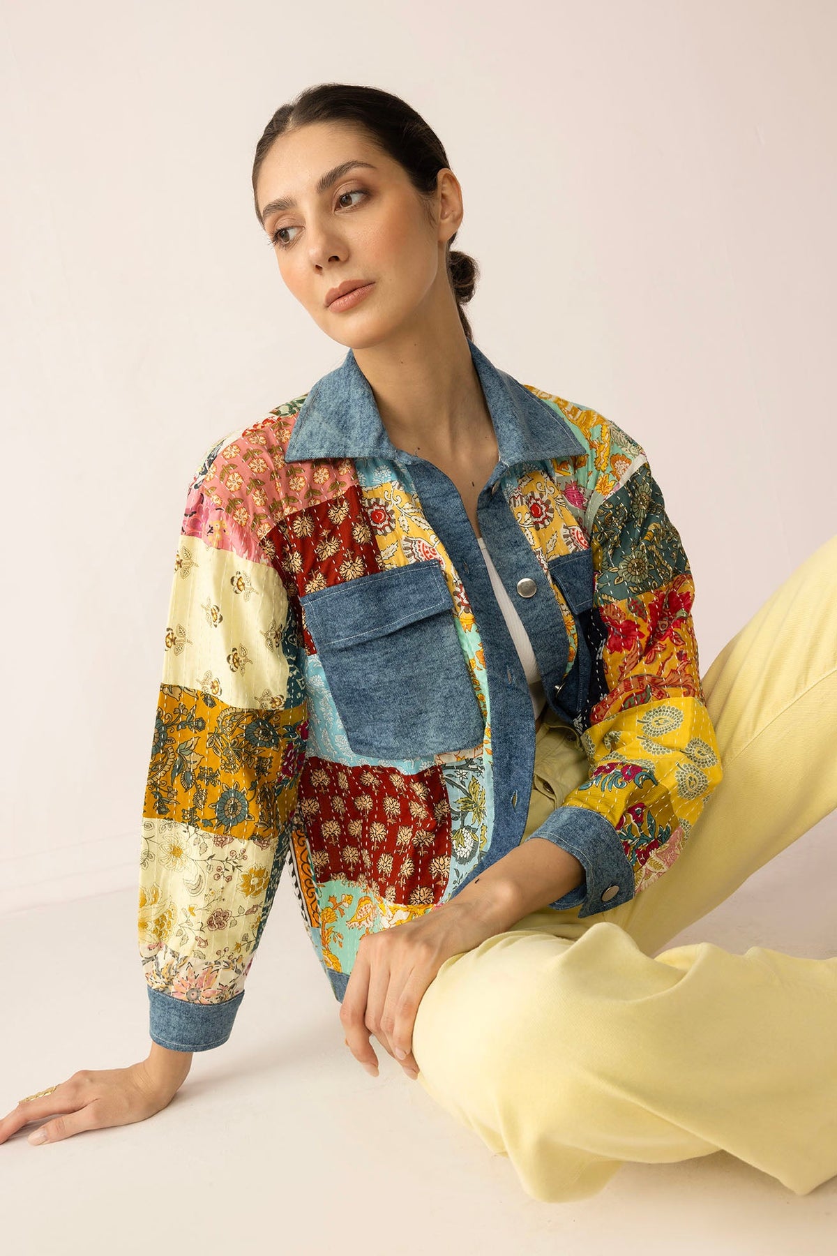 Loretta's Wild Patchwork Denim Jacket by Myra USA featuring colorful painted denim and patchwork design, front view.