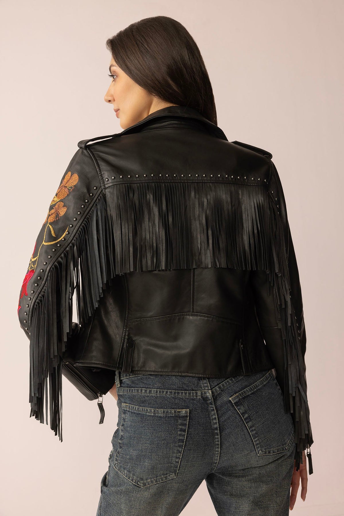 Myra USA Thorn & Thunder Leather Jacket in Ink Bloom with detailed stitching and stylish design, displayed on a hanger.