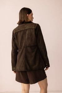 Myra USA Grit & Glisten Leather Jacket in Shadow Brown, close-up of stylish brown leather jacket with textured details.