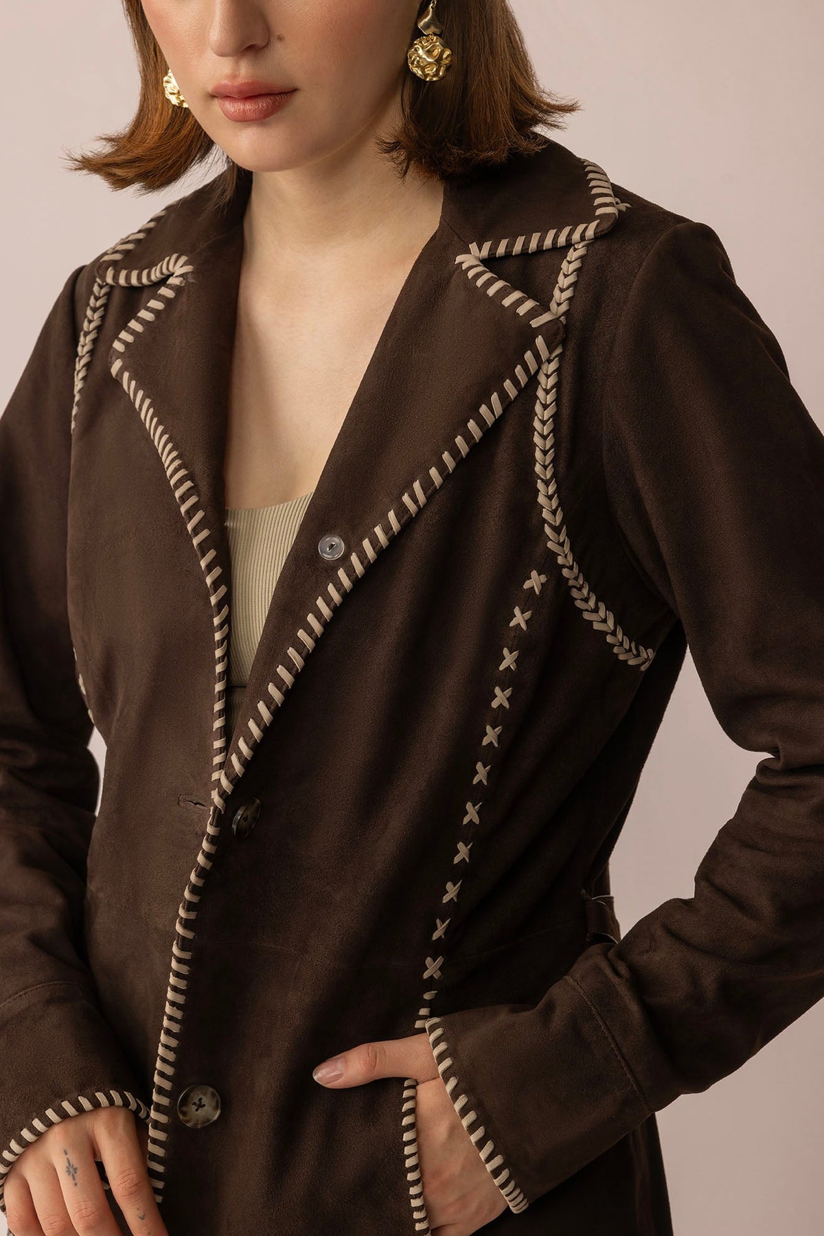 Myra USA Wandering Compass Leather Jacket in Sierra Black, close-up showing black leather with subtle stitching details.