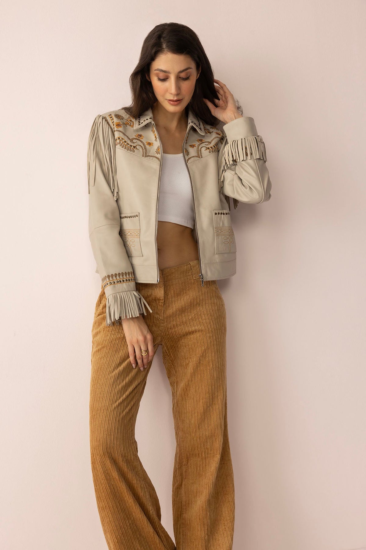 Dust & Daisies leather jacket in Starlit White by Myra USA, showcasing a stylish white leather jacket with subtle daisy details.