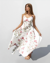 Red vine cross back maxi dress from nibimtk.com, flowing silhouette with stylish back design, perfect for elegant occasions.