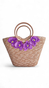 NIKOZA Goddess in Lilac Straw Beach Bag with woven design and shoulder straps, perfect for summer outings.