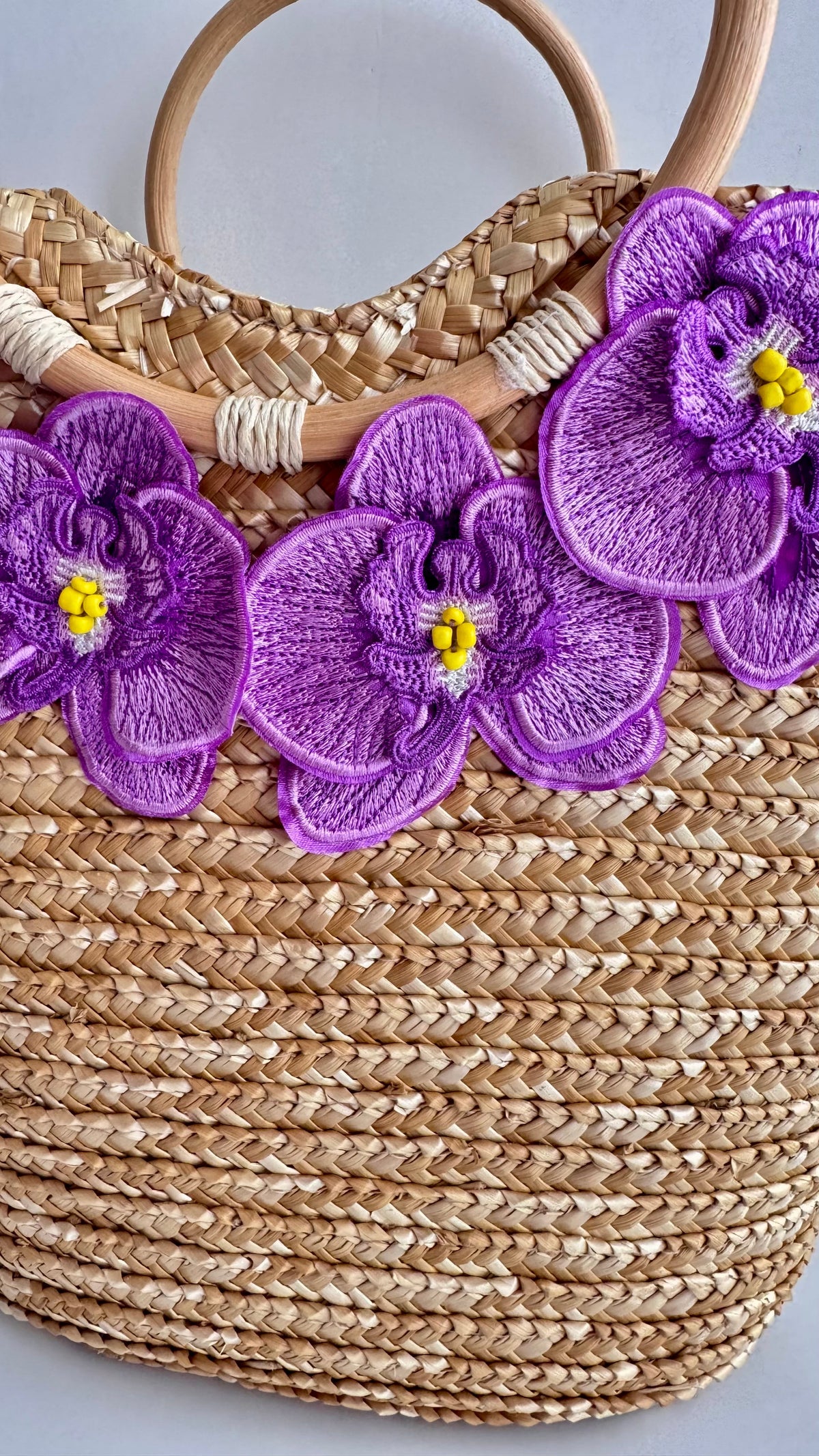 NIKOZA Goddess in Lilac Straw Beach Bag with woven design and handles, perfect for summer outings and beach days.