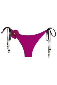White NIKOZA Lycaste bikini bottom with a sleek, minimal design, shown on a plain background.