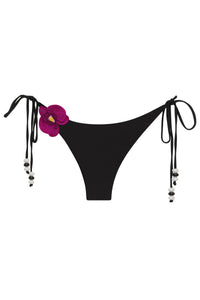 White Lycaste bikini bottom by NIKOZA featuring a sleek, minimal design suitable for swimwear or beachwear.